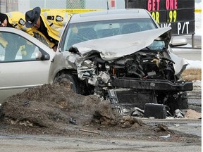 Police investigate a fatal collision on March 8, 2012. Const. Chris Luimes has pleaded not guilty to dangerous driving causing death in relation to the crash. An 84-year-old woman was killed in the crash.
