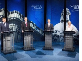 From left Wildrose Party leader Brian Jean, Liberal leader David Swann, Alberta Progressive Conservative leader Jim Prentice and NDP leader Rachel Notley stand for a photo op before leaders debate in Edmonton on Thursday, April 23, 2015.THE CANADIAN PRESS/Jason Franson