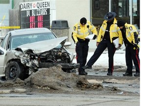 Police investigate a fatal collision on March 8, 2012. Const. Chris Luimes has pleaded not guilty to dangerous driving causing death in relation to the crash that killed 84-year-old Anne Cecilia Walden.