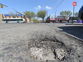 Potholes at 108th Street and Whyte Avenue in Edmonton on May 13, 2015.