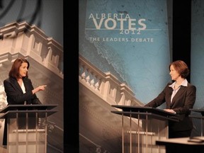 Alberta Wildrose leader Danielle Smith, left, and Alison Redford the Progressive Conservative Party Leader at the Provincial leadership debate at Global television studios on April 12, 2012.