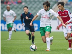 Raul of New York Cosmos, centre, in action during the 2015 Lunar New Year Cup match between South China and the New York Cosmos at Hong Kong Stadium on February 19, 2015, in So Kon Po, Hong Kong.