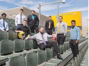 New recruits, clockwise from left, Jon Girma, Dryden Kalesnikoff, Ramey Kharfan, Court Boice, Peter Kozushka, Shaydon Philip, Garrett Meek, and Rory O’Donovan after a press conference introducing the 2015 Golden Bears football recruiting class at Foote Field on May 1, 2015.