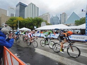 Riders complete the second lap during Stage 5, a 124 km 11 lap circuit through downtown Edmonton at the 2014 Tour of Alberta in Edmonton, September 7, 2014.