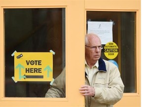Robert Fitzsimmons leaves after voting in the advance poll at Edmonton’s McKernan Community Hall on April 29, 2015. Letter writers are urging voters to reject the politics of fear and retribution.