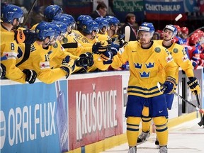OSTRAVA, CZECH REPUBLIC - MAY 14: Sweden's Anton Lander (#58) high fives the bench after scoring Team Sweden's second goal of the game during quarterfinal round action at the 2015 IIHF Ice Hockey World Championship.