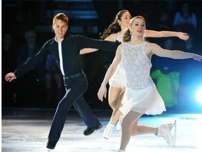 Shawn Sawyer, Kaetlyn Osmond and Joannie Rochette perform a routine during the Stars on Ice show at Rexall Place on May 9, 2004.