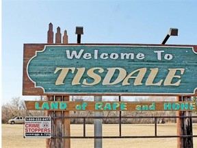 The sign welcoming visitors to Tisdale, Sask., is shown on April 21, 2015. The small northern town is asking residents whether it’s time to change its longtime slogan from “Land of Rape and Honey.”