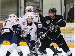 Spruce Grove centre Tyler Busch, centre, scored a goal and an assist to help the Saints jump out to an early 4-0 lead in Tuesday’s Western Canada Cup game against the Fort McMurray Oil Barons at the Casman Centre in Fort McMurray.