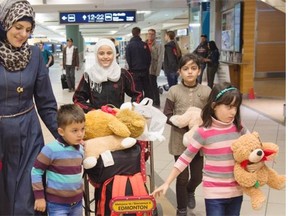 Syrian refugee Hala Aldajani and her family received a warm welcome at Edmonton International Airport in Edmonton on May 12, 2015.