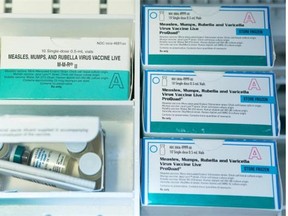 This Thursday, Jan. 29, 2015, file photo, shows boxes of the measles, mumps and rubella virus vaccine (MMR) and measles, mumps, rubella and varicella vaccine inside a freezer at a doctor’s office.