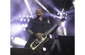 Volbeat lead singer, Michael Poulsen entertains the crowd on May 2, 2015, in Edmonton.