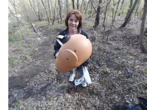 Volunteer Wendy Joy found Mr. Potato Head while working under the High Level Bridge while picking up trash in Walterdale Park in Edmonton on Sunday as part of the River Valley Clean Up.