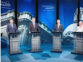 Wildrose Leader Brian Jean (from left), Liberal interim leader David Swann, Progressive Conservative Leader Jim Prentice, NDP Leader Rachel Notley prepare for their televised debate in the Global television studio on April 23, 2015 in Edmonton.