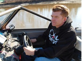 Wildrose Leader Brian Jean pilots his jet boat on the Clearwater River in Fort McMurray on the weekend.