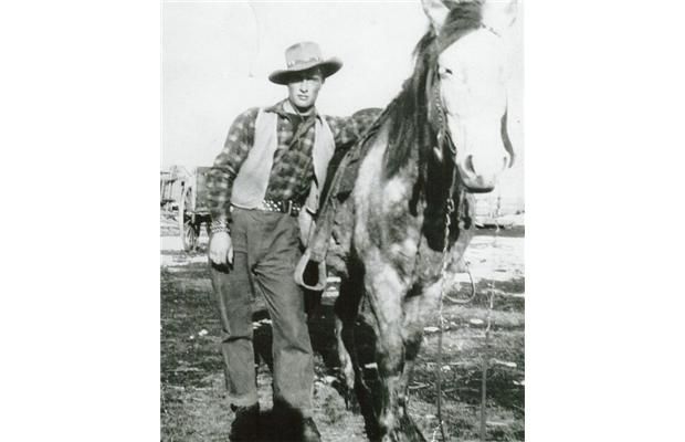Jerry Killips, approximately age 18, with one of his trusted horses.