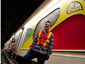 Aaron Paquette with his Grandin LRT station installation