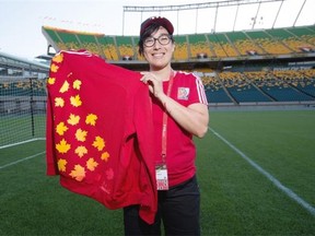 In advance of the FIFA Women’s World Cup Canada 2015, kicking off on June 6, Rita Sarrate picked up her uniform along with many of the other 365-plus Edmonton volunteers at the Commonwealth Community Recreation Centre on May 28, 2015.