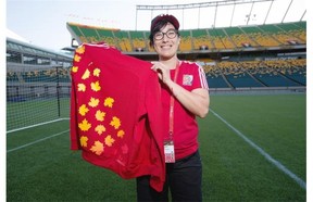 In advance of the FIFA Women’s World Cup Canada 2015, kicking off on June 6, Raquel Deleon picked up her uniform along with many of the other 365-plus Edmonton volunteers at the Commonwealth Community Recreation Centre on May 28, 2015.