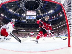 Canada forward Taylor Hall scores a goal against Czech Republic goalkeeper Ondrej Pavelec during the world hockey championship semifinal at O2 Arena in Prague, Czech Republic, on May 16, 2015.