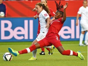 Canada’s Kadeisha Buchanan (3) knocks the ball from New Zealand’s Annalie Longo (16) during the FIFA Women’s World Cup at Commonwealth Stadium in Edmonton on June 11, 2015.