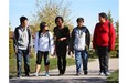 Captain Nichola Goddard School students, from left to right, Bryant Woo, Lily Huang, Juliet Omini, Immad Manzoor and Max Hernandez walk to school. The school has been nominated for its green commuting program which encourages students to find alternative transportation to school.