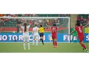 China celebrates a goal and a 1-0 win over the Netherlands during a FIFA Women’s World Cup game on June 11, 2015 at Commonwealth Stadium in Edmonton on June 11, 2015.