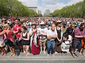 A crowd of thousands watches as Rachel Notley is sworn in as Alberta premier on Sunday, May 24, 2015.