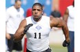 Defensive end Michael Sam runs through a drill during the NFL super regional combine football workout at Tempe, Ariz., on March 22, 2015.