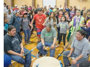 Drum circle group Mountain Soul performs for about 400 students during an education day for Indian Residential Schools Truth and Reconciliation in Calling Lake.