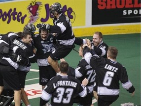 The Edmonton Rush celebrate their 11-10 win over the Toronto Rock in the National Lacrosse League Champion’s Cup final on June 5, 2015, at Rexall Place.