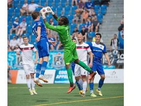 FC Edmonton striker Daryl Fordyce looks for an opportunity in front of Atlanta Silverbacks goalkeeper Steward Ceus during Sunday’s North American Soccer League game at Clarke Field.