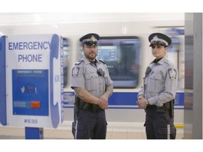 Edmonton Transit peace officers Sgt. Jason Svekla, left, and Dee Sran in Churchill station. ETS officers recently received training in mental health first aid.