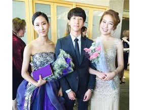 From left, Mua Kim, Josh Lee and Julia Shim at the 2015 Lillian Osborne High School graduation banquet on May 22.