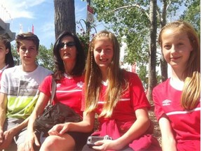 From left, Rebecca Heather, 13, Anthony Heather, 16, mom Darlene Heather, Nicole Heather, 11, and Kathleen Heather, 13. The family is from Calgary and all the kids play soccer. They’re excited to be at Commonwealth Stadium to watch the FIFA Women’s World Cup games on Saturday, June 6, 2015.