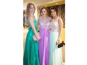 From left, Tatiana Marciniak, Ambriella Aucoin and Melania Stavale at the 2015 Archbishop MacDonald High School graduation banquet on May 23.