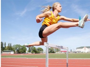 Grace Werner, 16, of the Strathcona high school track team prepares for the 80m hurdles at the Alberta high school track and field championships June 5-6, 2015, in Lethbridge.