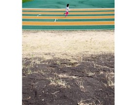 Dry grass at Foote Field in Edmonton on June 11, 2015. It’s the driest spring northern Alberta has had in 50 years.