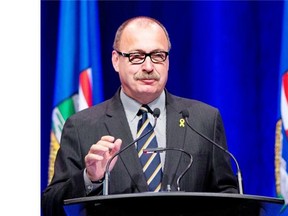 Interim Alberta PC leader Ric McIver speaks during the Progressive Conservatives Dinner in Calgary on May 14, 2015.