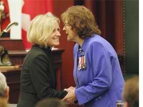 Lieutenant-governor Lois Mitchell (right) is congratulated by Alberta Premier Rachel Notley (left) after being installed as Alberta’s new Lieutenant-Governor at the Alberta Legislature on June 12, 2015.