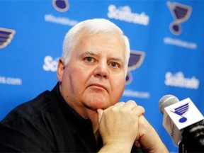 St. Louis Blues head coach Ken Hitchcock listens to a question during a news conference May 26, 2015, in St. Louis. The Blues are sticking with Hitchcock for another season, announcing the veteran NHL hockey coach has signed a one-year contract with the team.