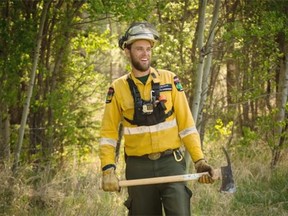 Louis Price, 31, Incident Commander and wildfire ranger with Alberta Agriculture and Forestry near a contained wildfire approximately 22 kilometres east of Slave Lake Alta. on May 27, 2015.