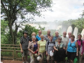 Members of Edmonton’s Friendship Force chapter pose near the Iquasu Falls dividing Brazil and Argentina, on a recent trip in February and March.