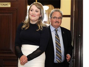 Deborah Drever emerges with Brian Mason following her swearing-in ceremony in the lieutenant governor’s office at the Alberta Legislature on June 1, 2015.