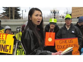 Dr. Nhung Tran-Davies speaks at a protest of Alberta's discovery math learning system in 2014. A new report blames the discovery-learning approach for 'statistically significant' declines in student math scores.