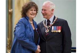 Governor General David Johnston invests Lois Mitchell, from Calgary, Alta. as a Member of the Order of Canada during a ceremony at Rideau Hall in Ottawa, on Friday May 3, 2013. Lois Mitchell has been appointed as the new Alberta lieutenant-governor.