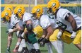 The offensive linemen at the Eskimos training camp at Fuhr Sports Park in Spruce Grove. June 4, 2015.