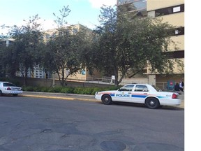 Police cars surround the Royal Alexandra Hospital Friday morning after a man was assaulted in a parking lot.