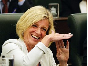 Premier Rachel Notley jokingly calls for a time out during the opening of the 29th Alberta Legislature in Edmonton on Thursday, June 11, 2015.