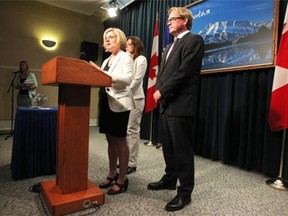 Premier Rachel Notley, left, was joined by Justice and Aboriginal Affairs Minister Kathleen Ganley and Education Minister David Eggen as she made announcements regarding funding for school boards on May 28, 2015.